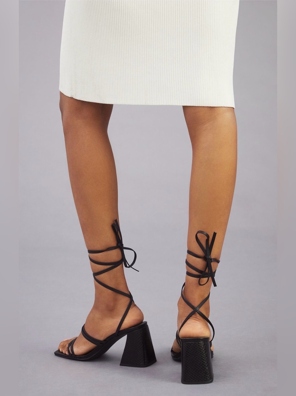 Dolce vita kash heeled sandals in black with gladiator ankle straps